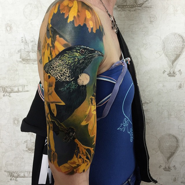 3D tattoo of bird on shoulder